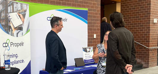 Propelr learning and development conference booth set up