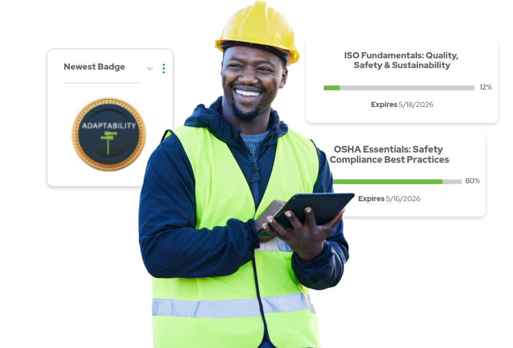 A smiling employee in protective vest and hard hat